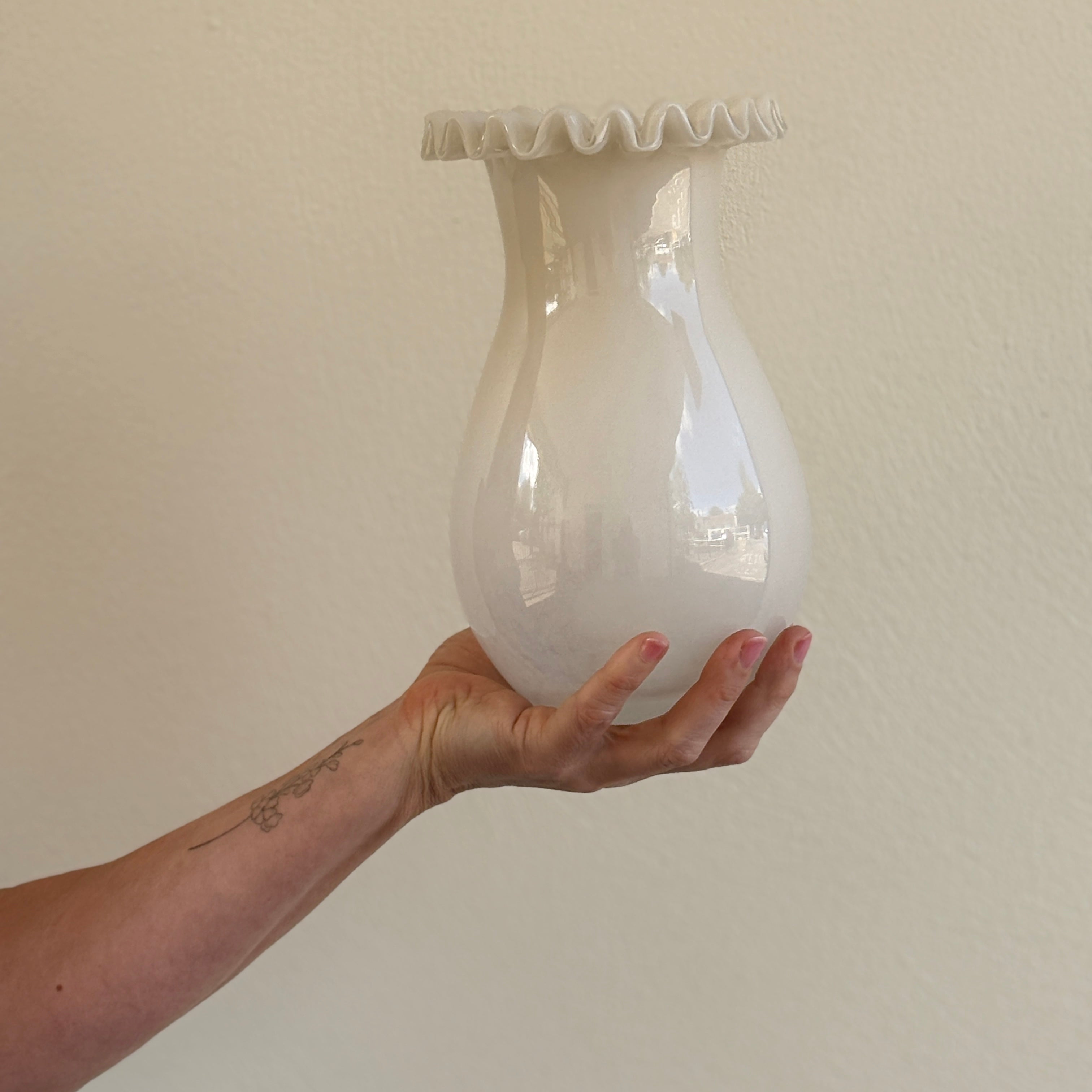 Opaque white fluted vase